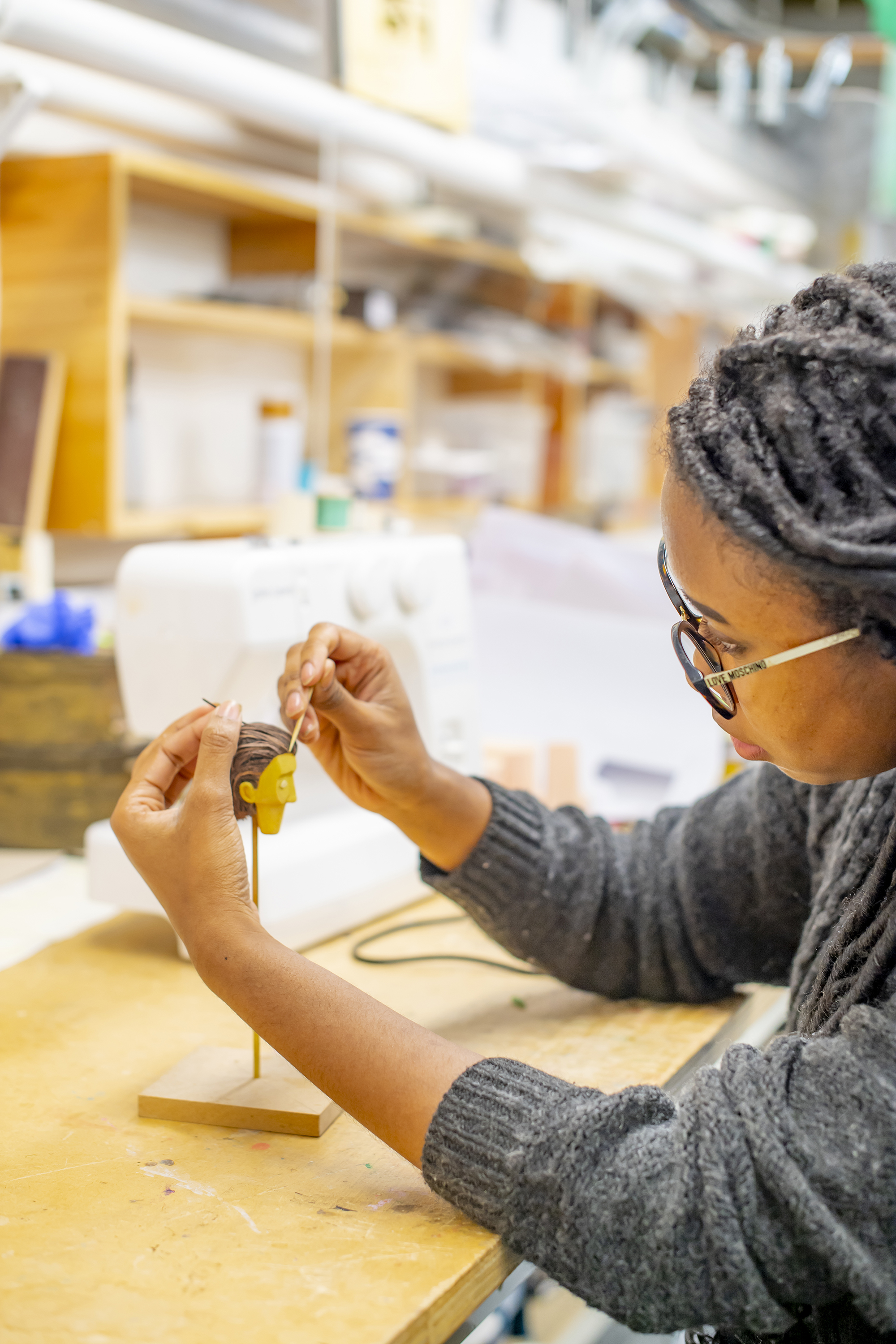 danielle painting model puppet head