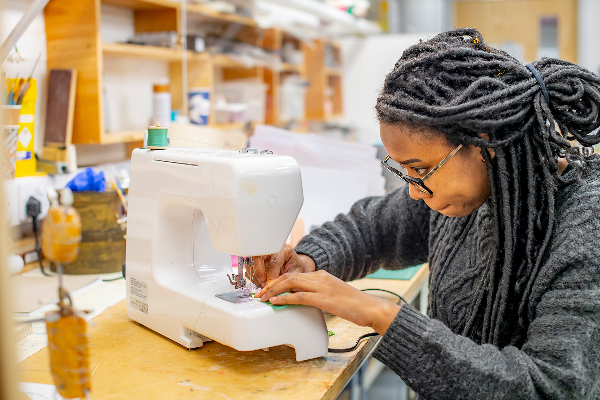 Student working in model making studio