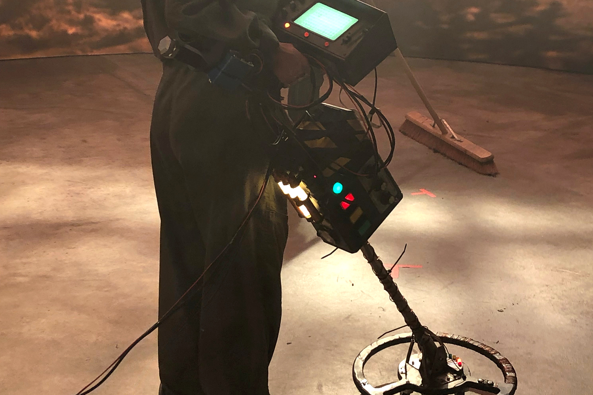 Actor holding a model prop