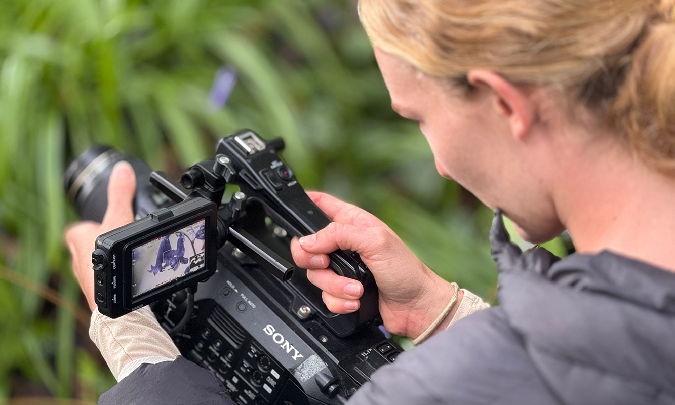 close up of girl with camera