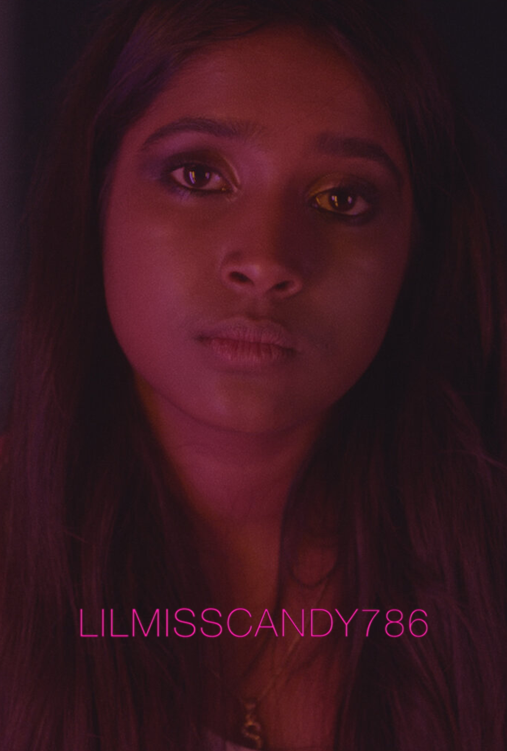 close up image of woman looking at camera